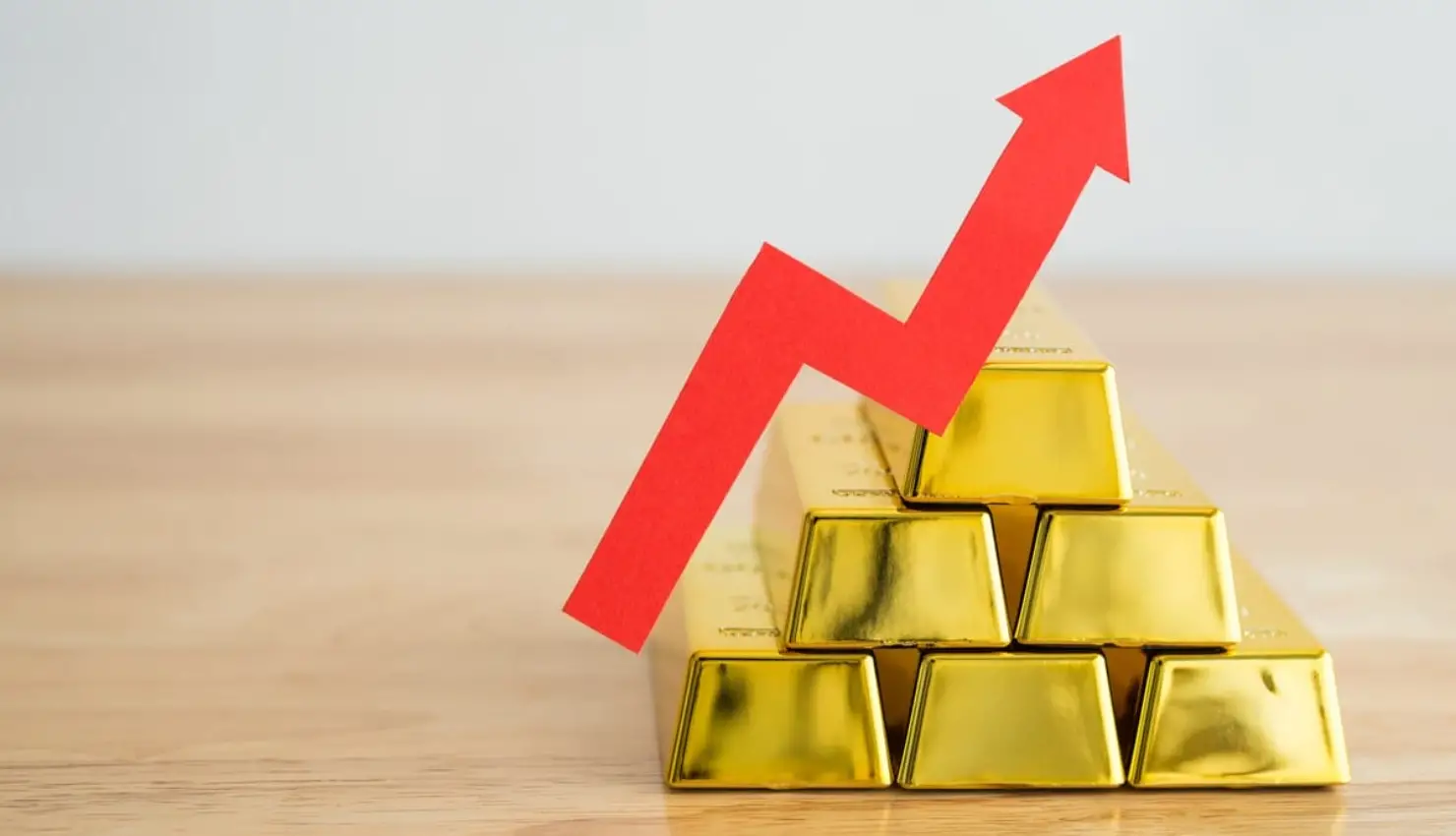 Gold Holds Near Two-Week High Amid Dovish Fed Bets